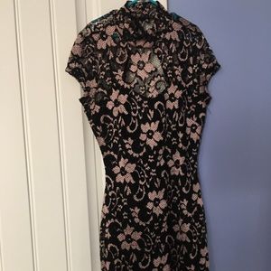Floral fitted high neck, cutout back dress! Size S